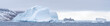 Cruise ship in Icebergs in Antarctica