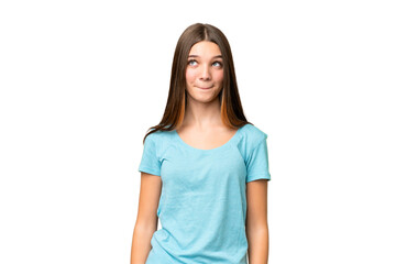 Sticker - Teenager girl over isolated chroma key background having doubts while looking up