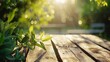 Wooden table in the garden with natural bokeh background.AI.