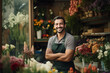 © Darya - A handsome young male florist gardener posing in greenhouse. Small business owner in flower shop