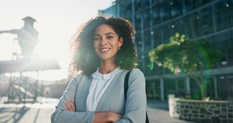 Poster - Business, face and happy woman with arms crossed in city street with positive attitude or confidence. Work, travel and portrait of lady entrepreneur with immigration pride, opportunity or career goal