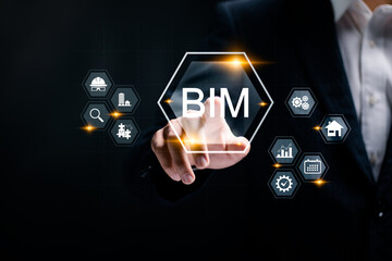 BIM, Building information modeling technology concept. BIM industry. Businessman touching with BIM icons on virtual screen.