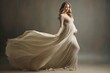 Elegant Pregnant Woman in Flowing Dress Posing Gracefully