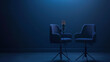 © JW Studio - Behind the scenes empty scene of two chairs and microphones stand in interview or podcast room isolated on dark navy background, concept of silence after the hubbub, intense preparation of the program