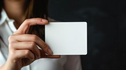 Aufkleber - Woman holding a white card, suitable for business or communication concepts