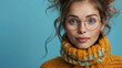 A youthful female with striking blue eyes, wearing stylish round glasses and a cozy yellow knitted sweater.