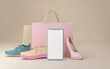copy space smartphone with shoes and shopping bags,business and e-commerce concept image