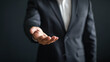 © Furkan - Business concept. Businessman shows your object in his hands.