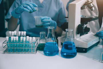 scientist works with a pipette and a test tube. scientific laboratory of biotechnology, development 