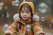 Pensive young girl in a hat surrounded by soap bubbles in a winter setting