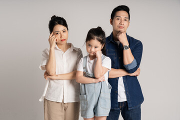 Wall Mural - Asian family portrait posing on white background