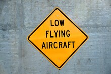 Low Flying Aircraft Sign At Airport Area.