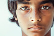 Indian teenage boy portrait, brunette kid, happy face, pretty child