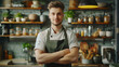 © Irina B - A presentable man in a green kitchen apron. The cook is working in the kitchen. Cook in uniform, protective clothing. Catering jobs, copy space