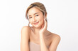 © Shutter B - Happy beautiful young asian woman smile touching her face on white background, clean fresh bare skin concept. Facial treatment, Perfect skin, Natural make up.