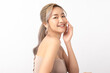 © Shutter B - Happy beautiful young asian woman smile touching her face on white background, clean fresh bare skin concept. Facial treatment, Perfect skin, Natural make up.