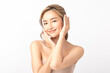 © Shutter B - Happy beautiful young asian woman smile touching her face on white background, clean fresh bare skin concept. Facial treatment, Perfect skin, Natural make up.