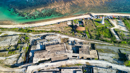 Wall Mural - Aerial view of abandoned contruction along Pandawa Beach in Bali, Indonesia
