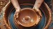 Hands Shaping Clay on Pottery Wheel