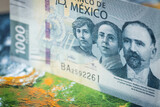 Fototapeta Zwierzęta - mexico money, 1000 mexican pesos banknote against the background of the world, financial market concept