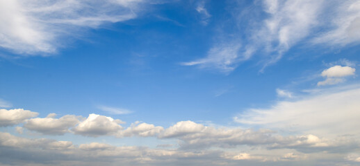 Poster - Blue sky and cumulus clouds. Wide photo.