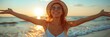 A carefree woman in sunglasses and a straw hat, embracing the sunset at the beach.