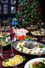 Sticker - Dinner plate of dorblu cheese, parmesan, brie cheese, honey and walnuts, Greek salad of fresh cucumber, tomato, sweet pepper, lettuce, feta cheese and olives.