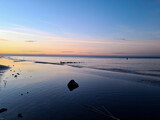 Fototapeta Do pokoju - plaża nad bałtykiem o zachodzie słońca