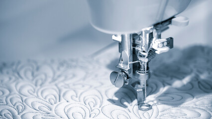 Aufkleber - Close-up detail of the sewing machine, Closeup of a modern sewing machine presser foot sewing fabric with thread Used for making clothes curtains and upholstery business hobby and handmade projects.
