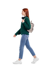 Wall Mural - Woman with headphones and backpack on white background