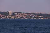 Fototapeta Morze - Cityscape View from the water to buildings in the city of Istanbul 