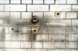 © squeebcreative - White Industrial Wall with Bricks and Stains and Dark Grouting