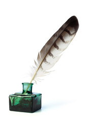 Wall Mural - Ancient bottle of ink with feather isolated on a white background