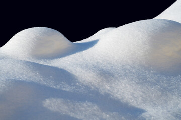 Wall Mural - white snow in daylight, background, isolate on black background