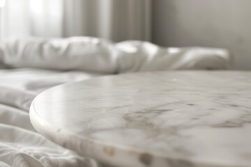 Wall Mural - Close up photo of modern bedroom with white bed and marble table top Background blurred