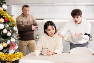 Canvas Print - Domestic quarrel during Christmas celebration - relatives scold a young girl