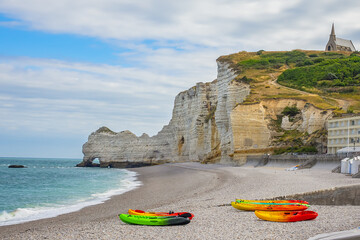 Wall Mural - Etretat - turquoise sea and alabaster cliff! Etretat is a commune in the Seine-Maritime department in the Haute-Normandie region in northwestern France. Etretat is now a famous French seaside resort.