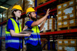 © ultramansk - operation workers checking and inspecting cargo for stack items for shipping. males worker checking the store factory. industry factory warehouse. Worker Scanning Package In Warehouse.