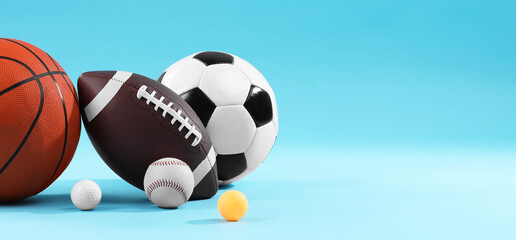  Many different sports balls on light blue background, space for text. Banner design