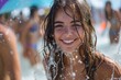 A young woman's radiant smile is accentuated by the sun and water droplets, suggesting summer and fun