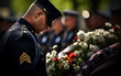 Military funeral coffin with flowers, dramatic event. Salute and respect one last time, many flowers. Farewell to a person