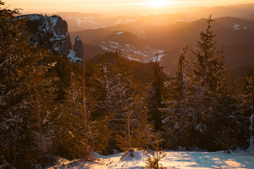 Wall Mural - Beautiful sunrise at winter in Ceahlau Mountains, Romania