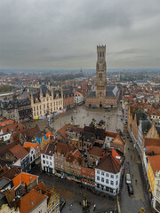 Wall Mural - Bruges in Belgium. Birds eye view of the grand place shot with a drone.