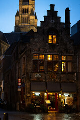 Wall Mural - Bruges in Belgium. Old house at dusk.