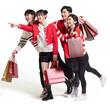 © Blue Jean Images - Happy young friends shopping for Chinese New Year