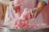 Close up of someone making cotton candy andy floss sweet