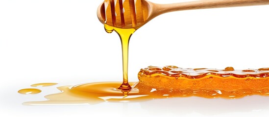 Poster - Golden honey dripping on a wooden spoon in a mouthwatering display of sweetness