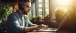 Focused Man Engrossed in Work, Immersed in Music with Headphones and Laptop