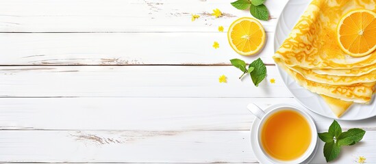 Aufkleber - Delicious Crepe Suzette with Orange Sauce and Coffee on White Wooden Background