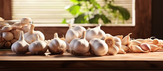 Poster - Aromatic Garlic Bulbs Displayed on a Wooden Table in a Rustic Kitchen Setting